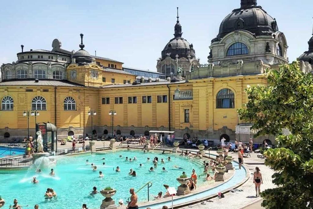 How should I dress for visiting thermal baths in Budapest?